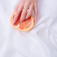 Weibliche Hand Orange Weibliche Hand Orange