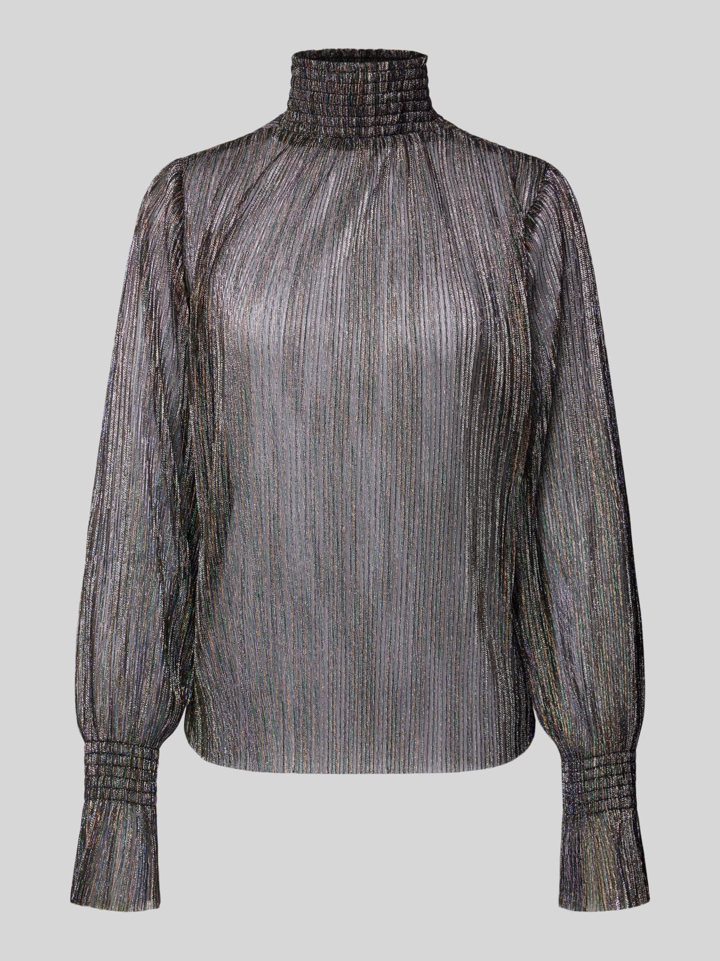 Constantly K über Mode-Trends der Party Season: "Mehr ist mehr – Glitzer, Pailletten und auffällige Schulterpolster!" Bluse